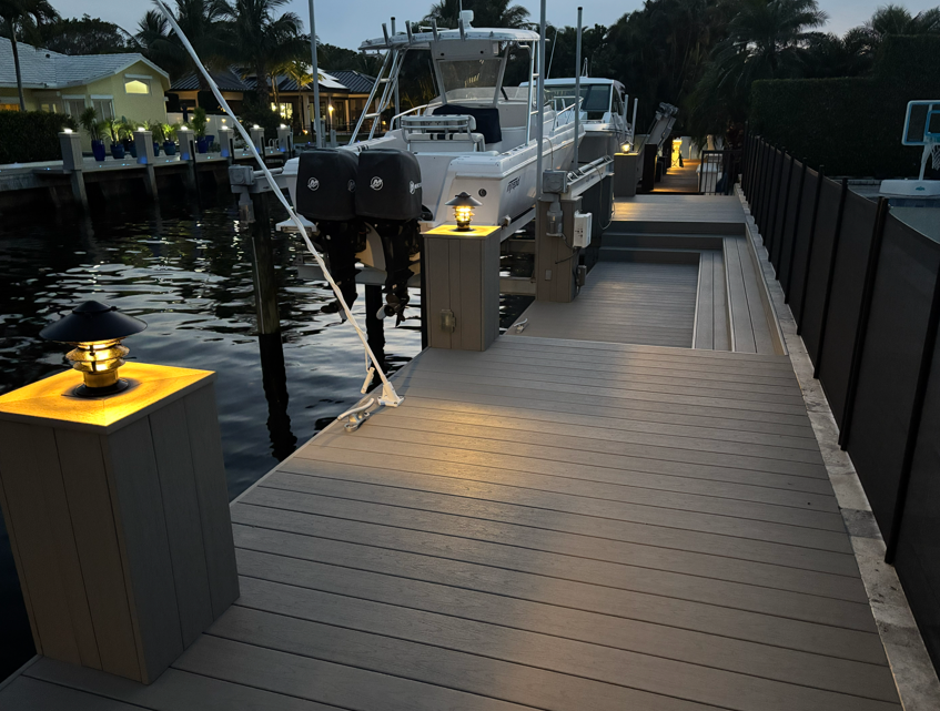 Timber Gray — illuminated marina dock at night