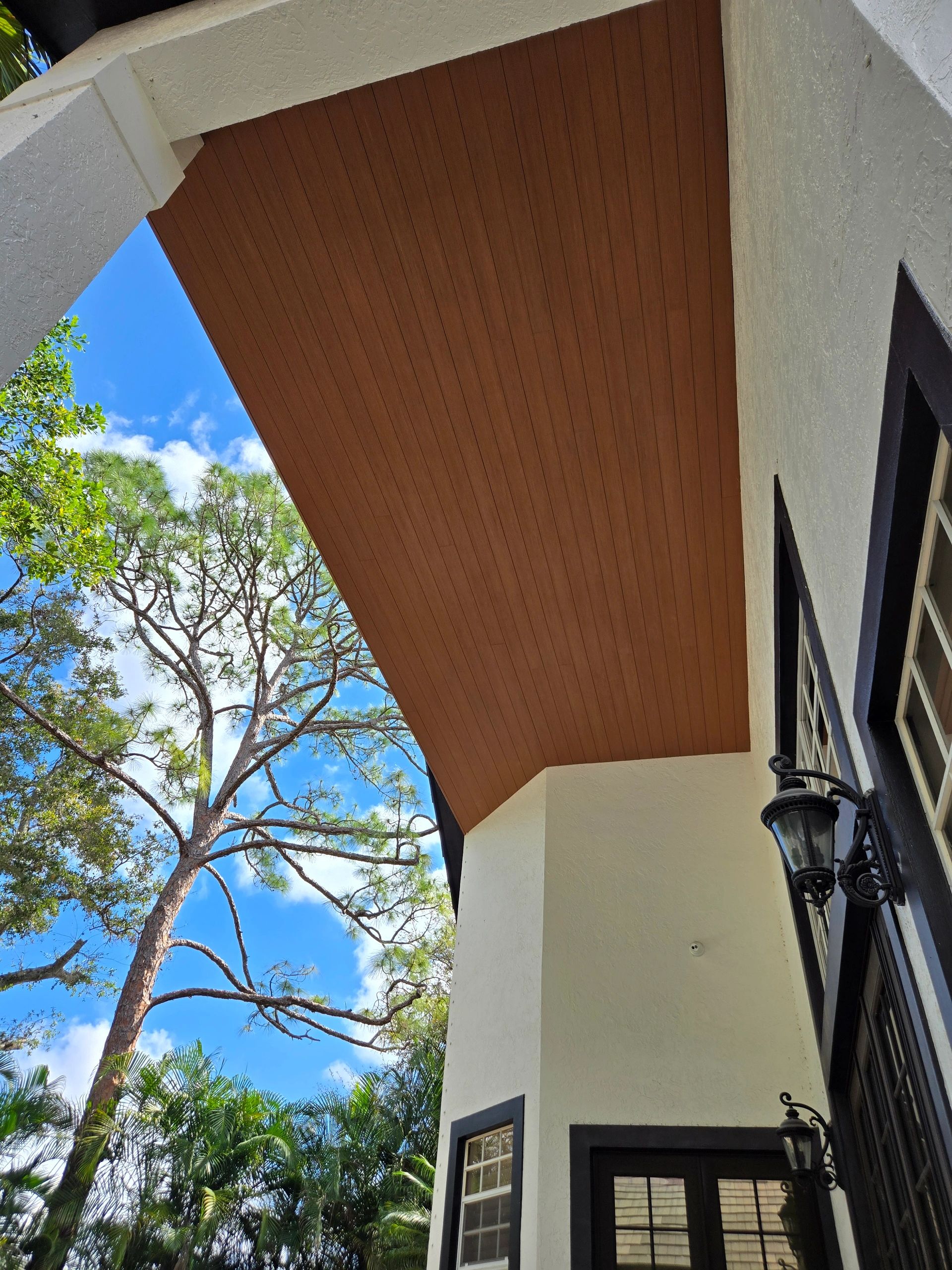 TimberTech PVC ceiling installation in Cypress color — Deckmasters of South Florida